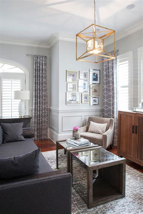 Navy Blue Sofa With Wood And Mirror Coffee Tables Transitional