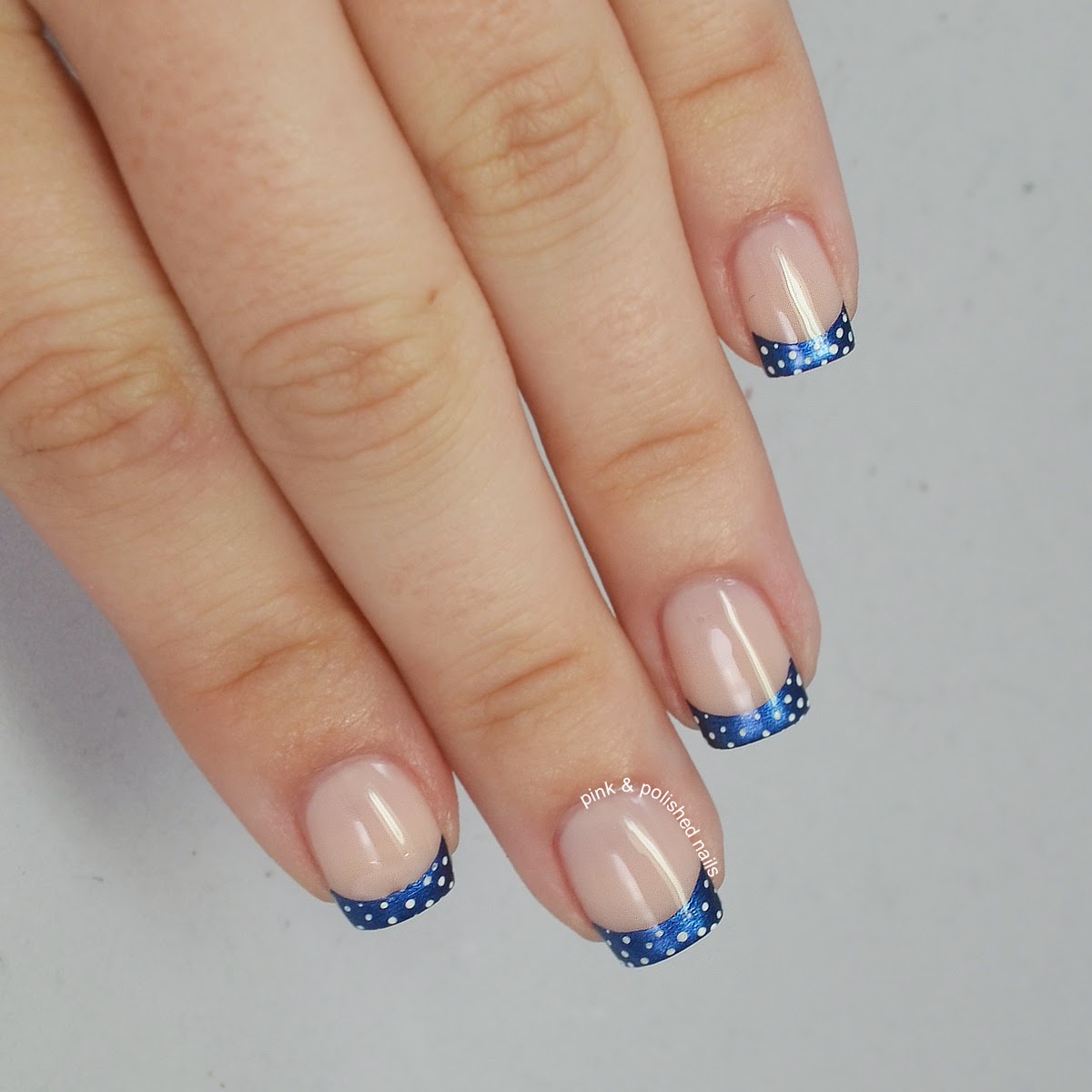 Pink Polished Navy French Tips With White Baby Dots