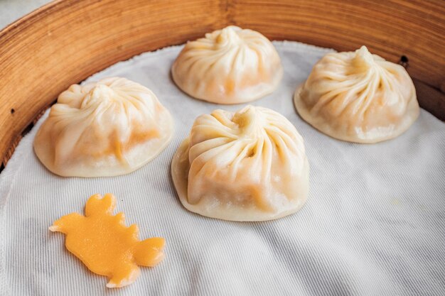 Premium Photo Xiao Long Bao Dumplings Freshly Steamed And Served In A