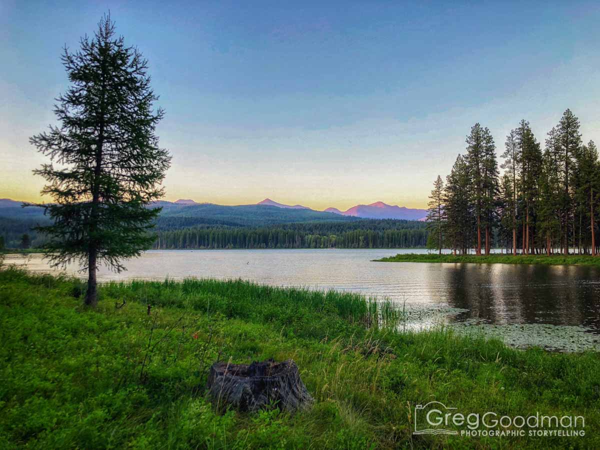 Sunset Over Seeley Lake And The Mountains Beyond Greg Goodman