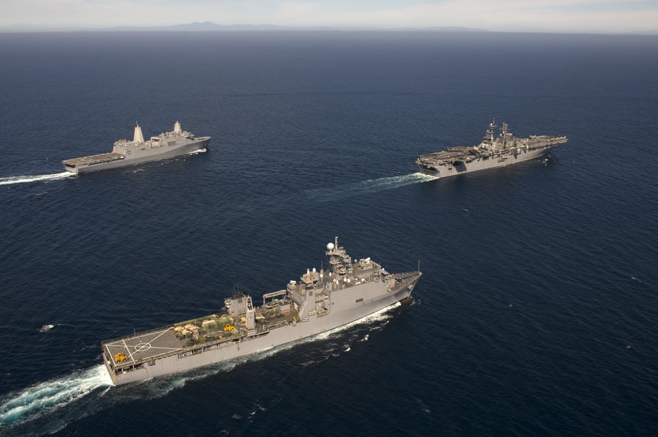 Three Us Amphibious Warfare Ships An Lhd Leading An Lpd Rear And An